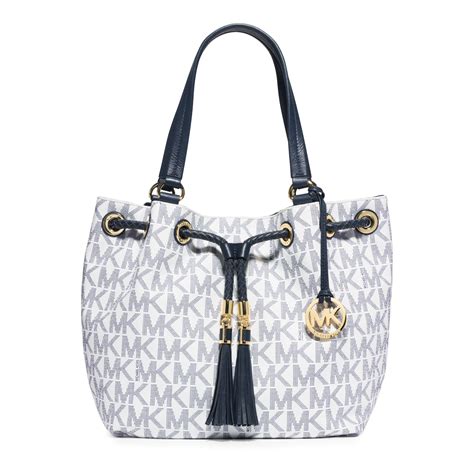 michael michael kors large jet set gathered tote|Michael Kors bag with airplanes.